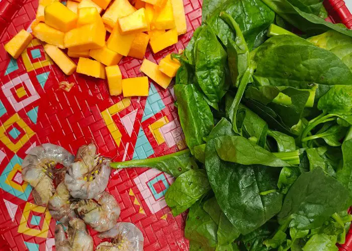 Prawns, pumpkin, and Malabar spinach for Puishak Chingri