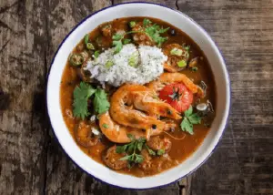 overhead shot soup with shrimps vegetables leaves